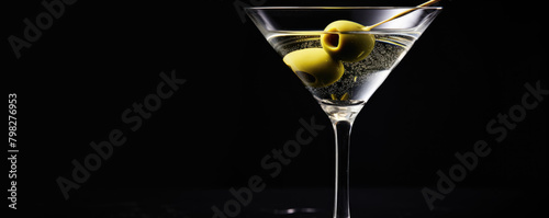 Classic coctail drink with olives on elegant on black background