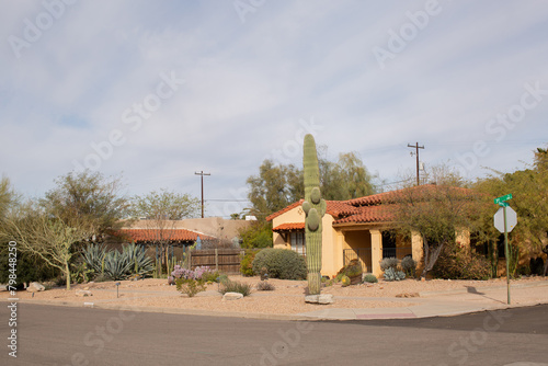 Exterior view from the street of a house on a corner in the Sam Hughes district of Tuscon, Arizona