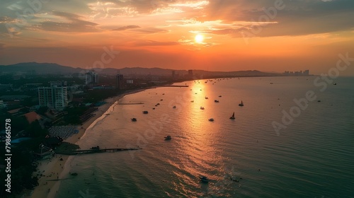 Scenic Aerial View of Pattaya Beach at Sunset with Glowing Horizon