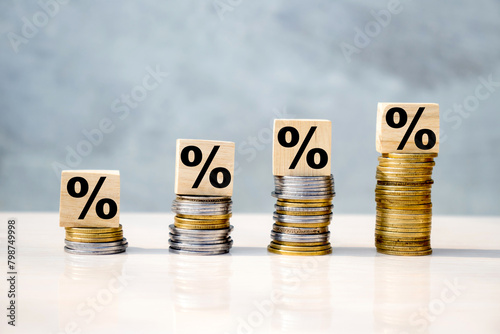Percentage icon on wooden cube stack of coin, investment growth, CAGR, capital growth, money saving SIP mutual fund ETF stock market dividend concept