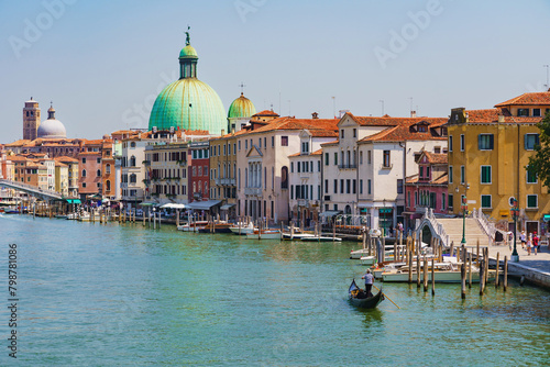 View of the gondolas of the Grand Canal on a sunny day in Venice, Italy