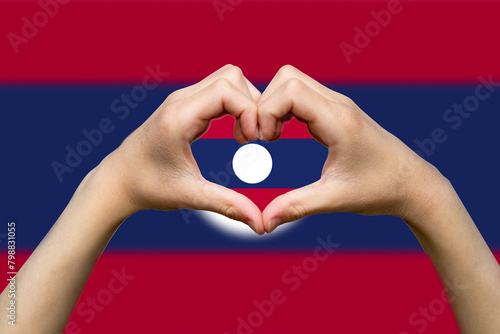 Laos flag with two hands heart shape, patriotism and nationalism idea, vector design, support or 