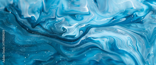 Soothing azure marble ink cascades elegantly over a captivating abstract scene, shimmering with scattered glitters.