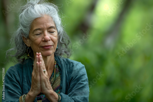 Meditation in the Jungle: Elderly Woman with Grey Hair Meditating in Nature