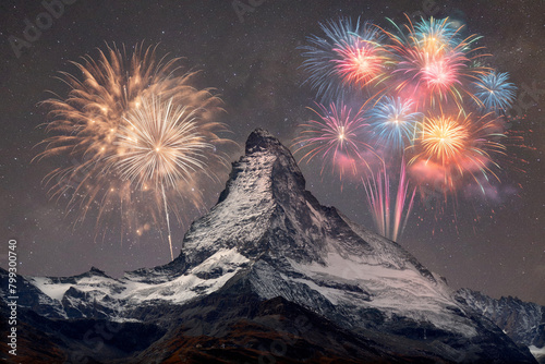 Fireworks behind mountain matterhorn in switzerland representing a national holiday celebration
