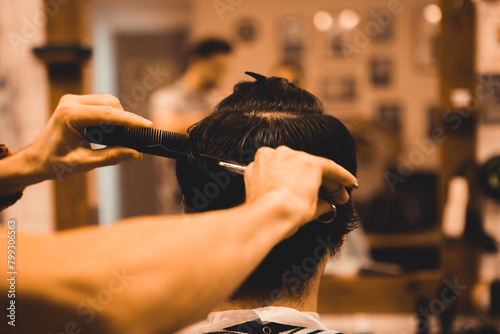 Men's hair cutting in a barbershop
