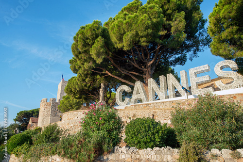 Sign "Cannes" next to Eglise Notre-Dame d'Esperance