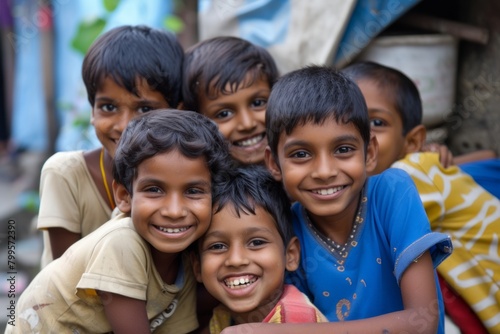 Indian children smiling at the camera. India, Goa