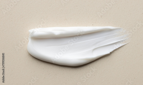 sample of cosmetic cream on light background