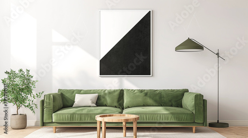 Black and white abstract poster, complements a green couch and wooden decor.