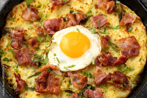 A British Classic, Bubble and Squeak baked with mashed potatoes with cabbage, bacon and eggs