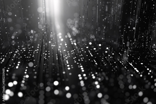 monochrome digital rain with bright vertical light streaks and scattered glowing dots on a dark background