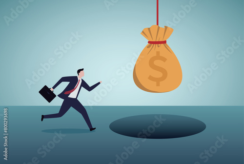 Money temptation and trap. Businessman running to a money bag hanging up on a hole.