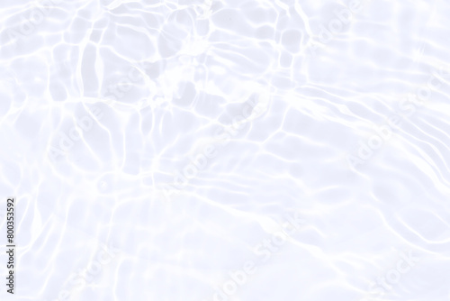Abstract water background with ripple. White water texture background. white water waves effects. Closeup of transparent white clear water. Summer light background. For cosmetic moisturizer background