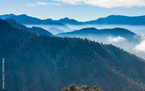 Beautiful mountain scenery on the background of clouds, layers of mountains on the horizon, Sierra Nevada Mountains, California, USA