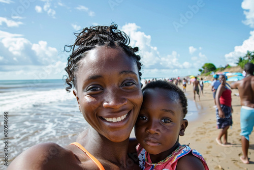Mother and daughter on the beach self portrait