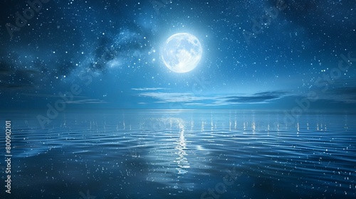 Full moon rising over a calm sea with a starry night sky
