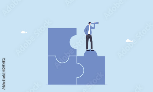 Businessman standing on uncompleted jigsaw looking for missing piece, finding solution or search for last missing piece to finish or complete work, leadership mission or business difficulty concept.