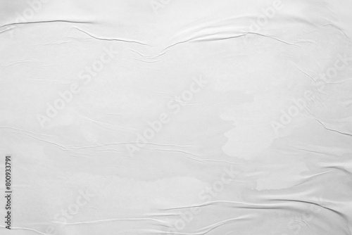 white crumpled and creased glued wrinkled paper poster texture background