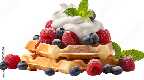 Indulge in a stack of waffles adorned with fresh fruit and clouds of whipped cream