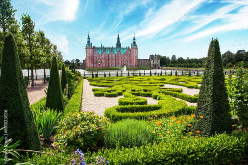 beautiful landscape with magical incredible gardens and park Frederiksborg slot Castle near Copenhagen. Hillerod, Denmark. Exotic amazing places. Popular tourist atraction.