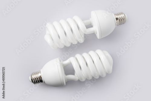 two fluorescent light bulb on white background