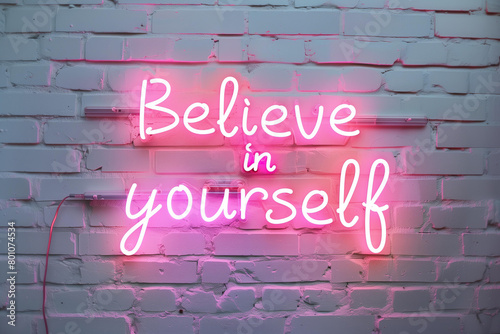 Neon sign with the words believe in yourself on white brick wall, pink neon light, urban art style. motivational phrase, motivation, affirmation