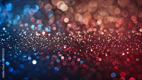 Abstract background of red, blue and white bokeh lights.