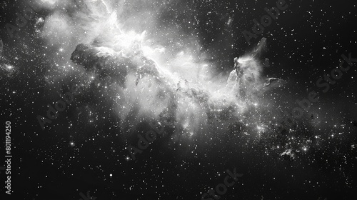 A grayscale image of a nebula in deep space with stars.