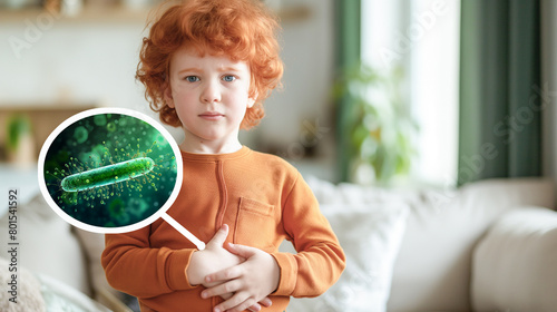 Red-haired child with stomach pain, and collage macro illustration of bacteria, intestinal infection or flu concept of children's health and hygiene. Copy space