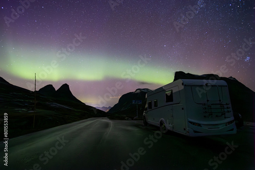 Northern lights and motorhome camper in Trollstigen road in Norway, Europe