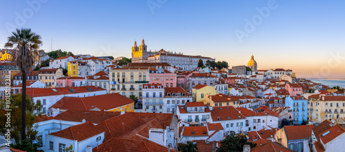 Panoramic view of skyline of Lisbon city, Portugal, many colorful houses in the Alfama district.
