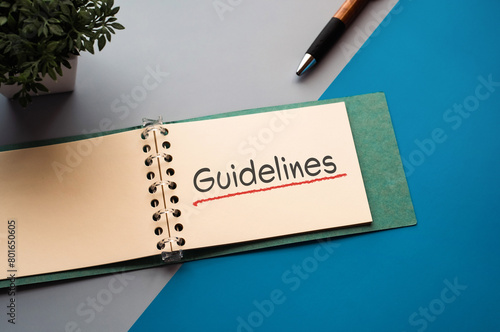 There is notebook with the word Guidelines. It is as an eye-catching image.