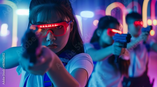 Two children are engaged in an intense laser tag battle, wearing high-tech visors and wielding laser guns amidst a vibrant, neon-lit gaming arena with a sci-fi ambiance