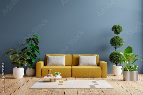 Modern living room has an yellow sofa on empty dark blue wall background- 3D rendering