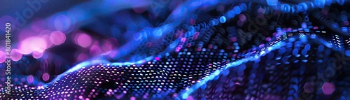 Macro shot of a high tech fabric weave incorporating smart fibers glowing under UV light