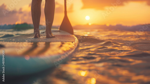Close-Up of Woman Holding Paddleboard Walking to the Beach