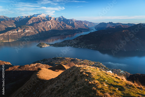 The sunset on Lake Como, at the end of a winter day, taken from Mount Crocione, near the town of Tremezzo, Italy - 24 December 2023