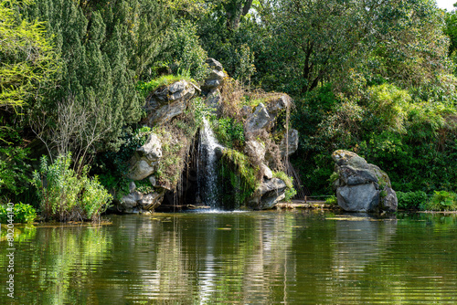Pond and Cascade in the Bagatelle Park at springtime. The Park is located in Boulogne-Billancourt near Paris, France