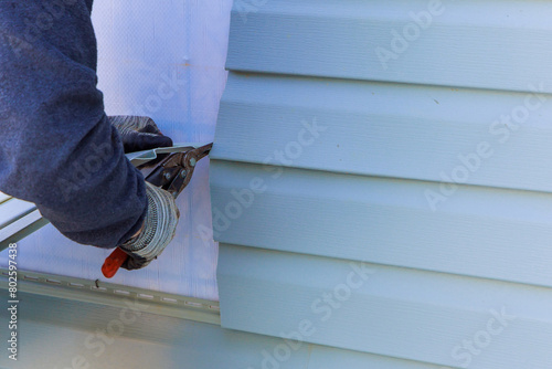 House exterior plastic siding was process replacement on exterior wall