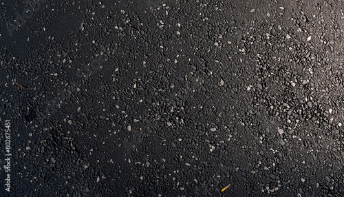 Black small road stone background, dark gravel pebbles stone texture seamless texture