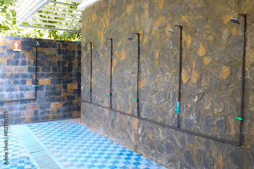 Public shower area with clean water facilities for refreshing showers.