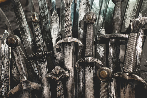 Metal knight swords background. Close up. The concept Knights.