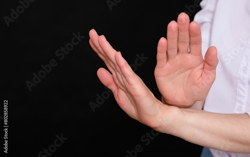 A woman shows gesture of refuse something