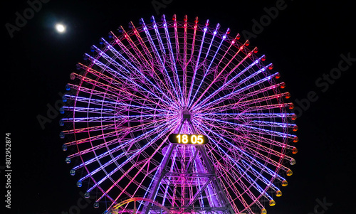 ferris wheel at cosmo world fun park at minato mirai , Yokohama is the third biggest city in Japan.