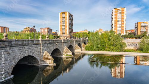 Skyline of the city of Madrid next to the bridge that crosses the Manzanares River to the south of the city.