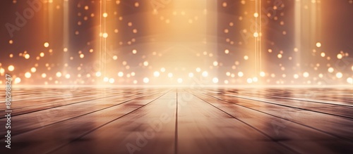 A copy space image of an empty show scene features lanterns a concrete floor and a captivating abstract background filled with bokeh lights and rays