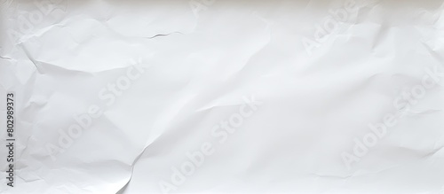 A copy space image with a textured surface resembling white paper