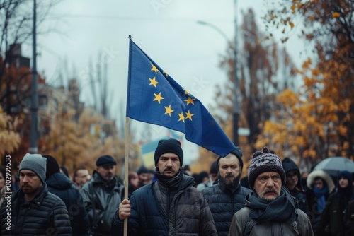 ..Georgian people passionately protest with EU flags against Russian laws, demanding sovereignty and freedom.