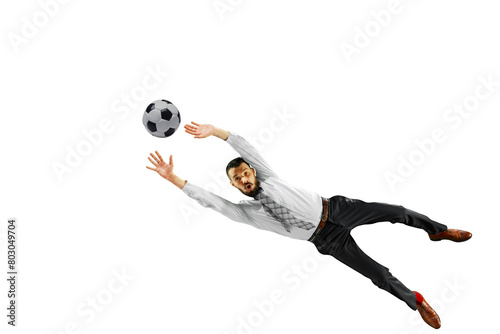 Focused businessman in formal wear in dynamic pose, jumping and catching ball isolated on transparent background. Concept of human emotions, sport, hobby, leisure activity, business